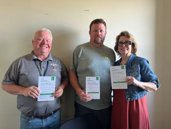 Local Presidents Keith Ogden, Billy Orr and Tracy Healy with their signed commitment cards.